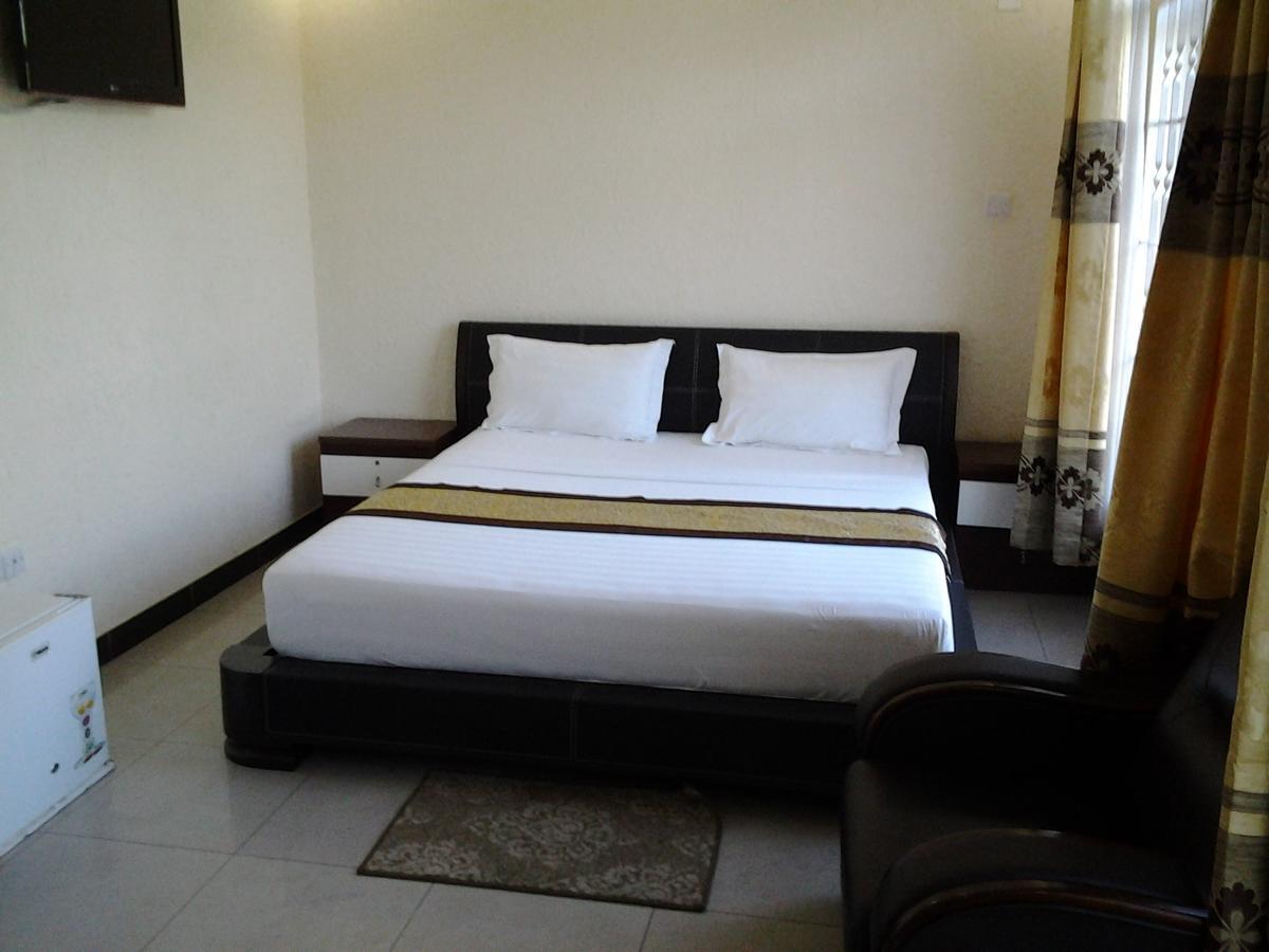 Best Point Hotel Dar es Salaam Quarto foto